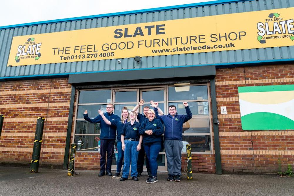 SLATE team members outside the Hunslet shop front